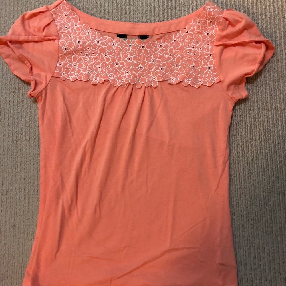 Flirty embroidered Ric Rac tee.